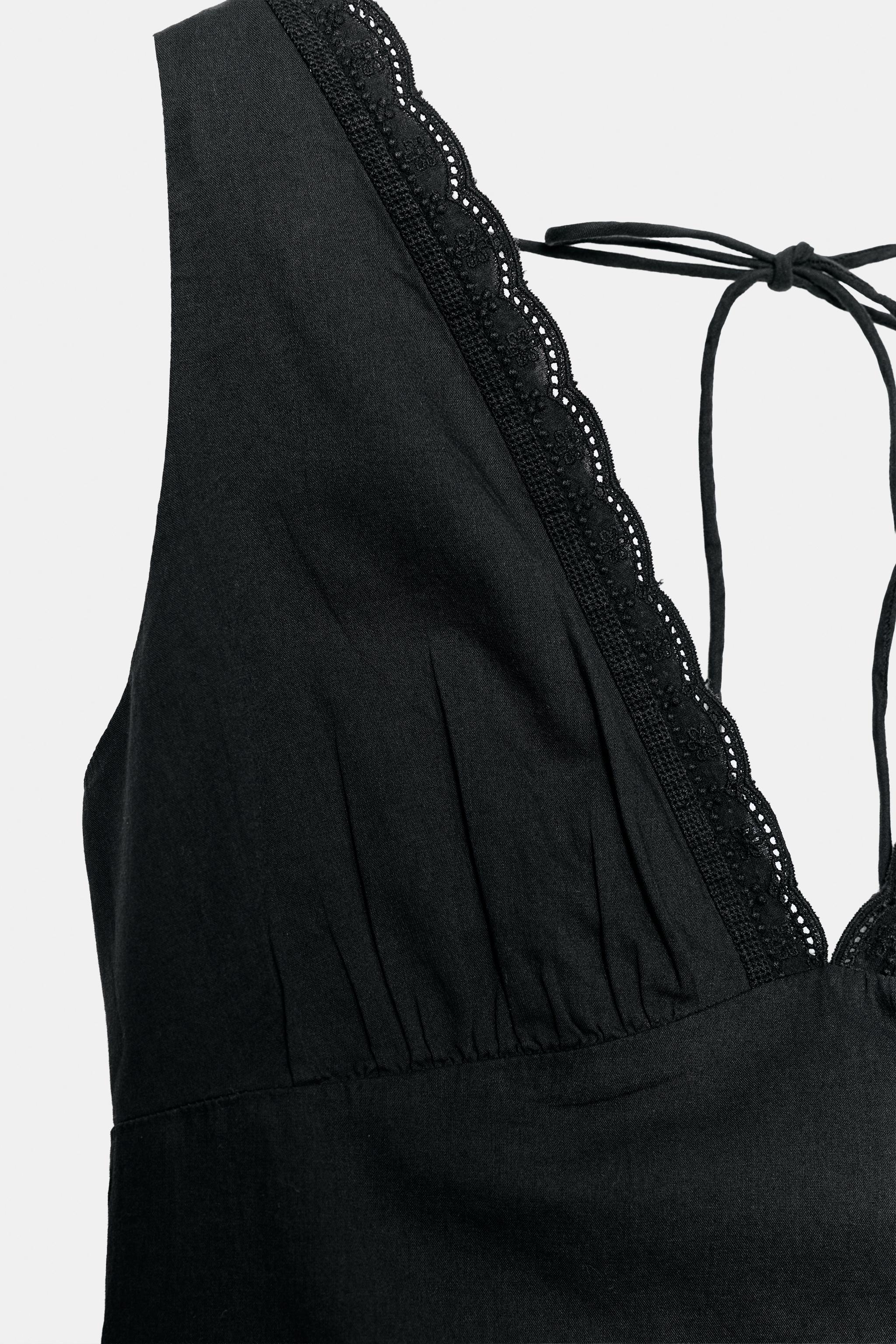 FLUID EMBROIDERED RUFFLED TOP